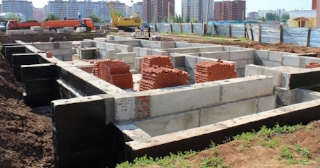 Фундаменты промышленных зданий в Ленинске-Кузнецком цена от 24509 руб. - заказать строительство фундамента промздания под стальные колонны